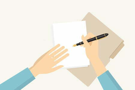 Person writing on piece of paper | Health Quality Alberta